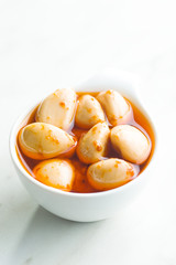 Tasty preserved garlic.