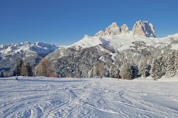 Obraz premium View of the Sassolungo (Langkofel) Group of the Italian Dolomites from the Val di Fassa Ski Area, Trentino-Alto-Adige region, Italy