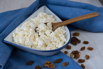 cottage cheese curd with wooden spoon on breakfast