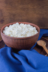 organic cottage cheese in a clay bowl