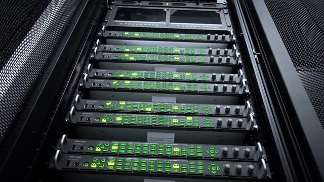 Web network, internet telecommunication technology, big data storage, cloud computing computer service business concept: server room interior in datacenter in blue light. 