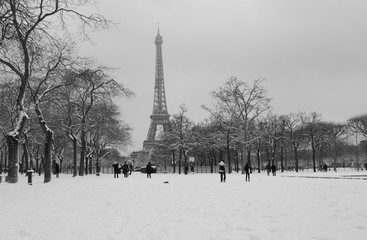 The Eiffel Tower snowday with walkers landscape