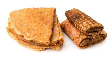 Pancakes rolled and pancakes triangles on a white
