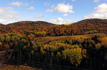 Aerial of colorful mountains during fall in Quebec