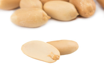 Peanuts isolated on the white background. Close up