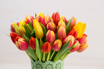 A colorful spring greetings card with tulips for Easter, Mother's Day.