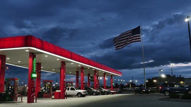 1988 American Flag next to Gas Station at Dusk, 4K