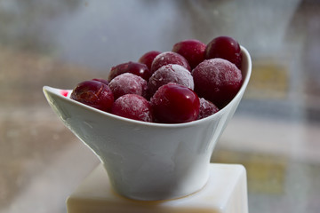 Frozen summer or frost on cherries