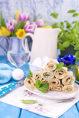 Homemade pancakes with mint and lime. Traditional Russian spring pastries. Delicious family breakfast. Cooking for carnival. Card.