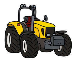 The yellow open heavy tractor
