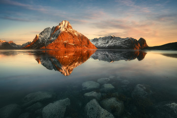 View of mountains with lake during sunset