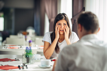 Shocked woman handling bad news,not believing negative event.Stressed crying female having...