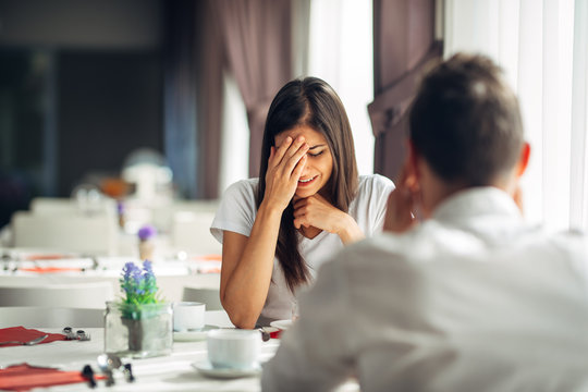 Crying stressed woman reaction to negative event,handling bad news.Breaking up long relationship.Emotional woman in grief,emotional pain.Couple fighting,marriage problems arguing.Domestic violence