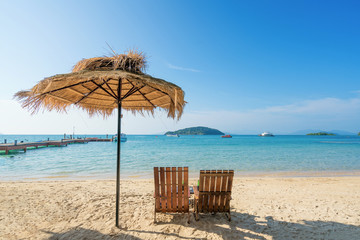 Beach Chairs and Umbrella on summer island in Phuket, Thailand. Summer, Travel, Vacation and Holiday concept.