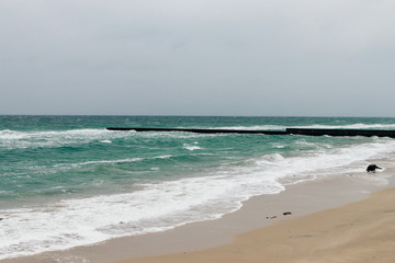 Empty coast with a pier