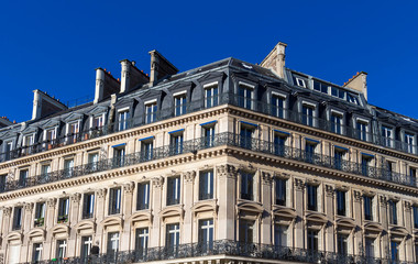 Fototapeta premium The traditional facade of Parisian building, France.