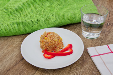 Buckwheat risotto with vegetable on a table