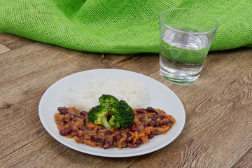 Azuki with vegetable and rice on table