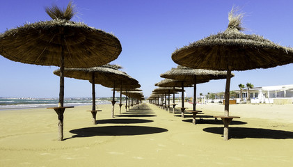 Umbrellas at a beach along the Mediterranean 