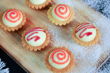 Delicious Egg Tarts On The Wooden Board.
