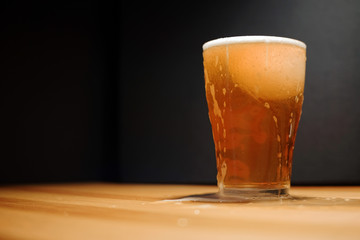 Beer with ice in the glass.