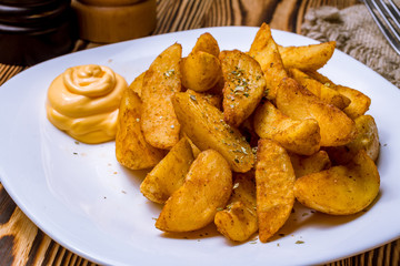 The potatoes wedges on the Board