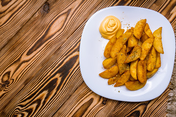 The potatoes wedges on the Board