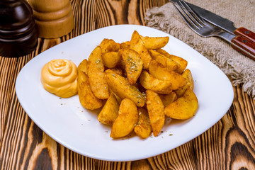 The potatoes wedges on the Board
