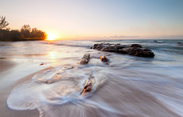 colorful sunset seascape with waves trails at Kudat Sabah Malaysia. 