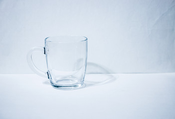 One empty glass beaker - Powered by Adobe