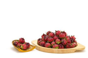 Roselle fruits in bamboo basket, isolated on white