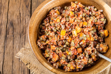 Red rice, lentils and butternut squash with carrot and quinoa in