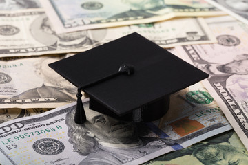 Graduation Cap On Dollar Banknotes