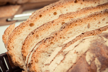 Vintage photo, Portions of fresh homemade baked traditional loaf of rye or wheat bread