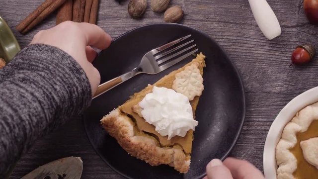 Step by step. Eating slice of freshly baked  pumpkin pie