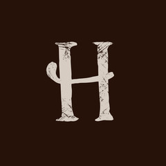 Letter H. Handwritten by dry brush. Rough strokes textured font. Vector illustration. Grunge style elegant alphabet.