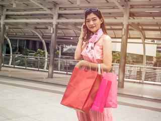 Sale, Happy shopper woman with shopping bags. Shopping concept