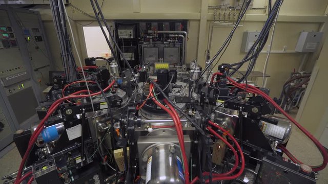 Innovative laboratory, automatic vacuum coating machine for silicon wafers.
