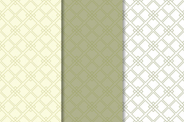 Olive green and white geometric ornaments. Set of seamless patterns