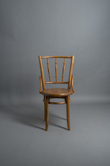 Beautiful wood chair on gray background