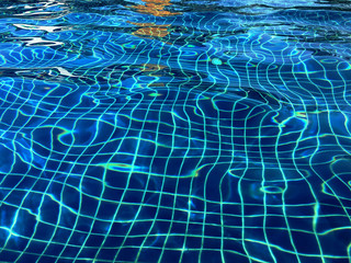blurry water rippled in swimming pool
