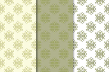 Set of pale olive green floral backgrounds. Seamless patterns