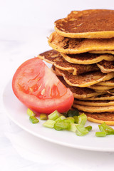 fried pancakes or pancakes are stacked - a traditional dish for the Spring Carnival festival, farewell to winter