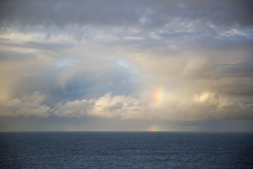 Fototapeta na wymiar clouds + rainbow