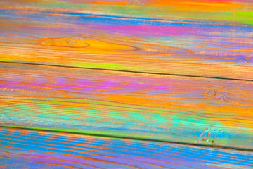 Bright multicolored blank background. Wooden background colored with colorful paints
