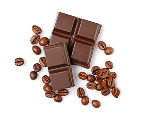 Close-up pieces of dark chocolate bar with coffee flavor and beans