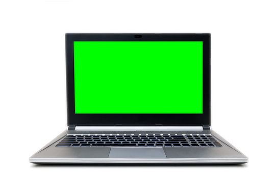 front view af isolated grey and black laptop with green screen