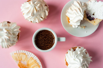  Coffee espresso in a white cup and cakes with meringues on a pink background. Gentle colors. Elegant  dessert. Serving option. Holiday. Wedding table.. Flat lay