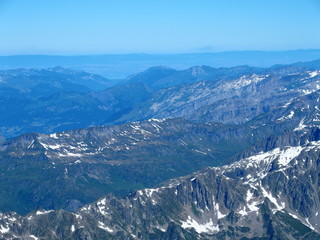 Alpine mountains range landscapes seen from Aiguille du Midi