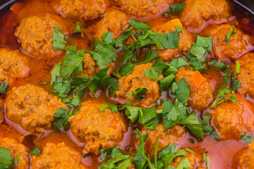 Hot meat meatballs in tomato sauce top view